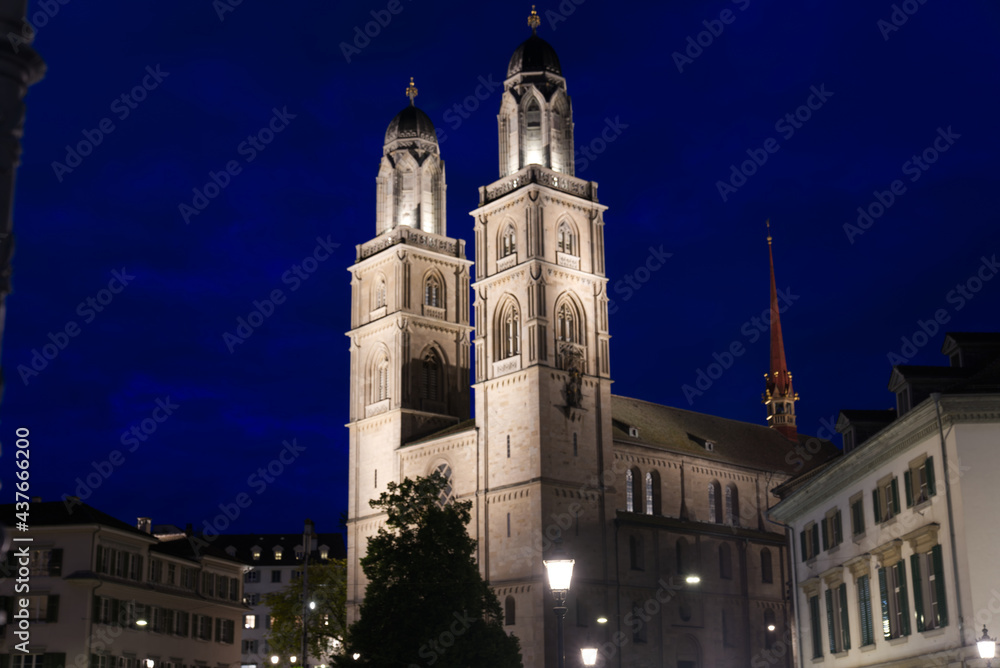 Church Grossmünster (Great Minster) at the old town of Zurich at night at summertime. Photo taken June 5th, 2021, Zurich, Switzerland.