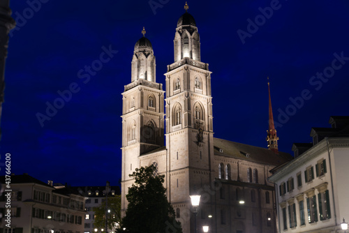 Church Grossmünster (Great Minster) at the old town of Zurich at night at summertime. Photo taken June 5th, 2021, Zurich, Switzerland.