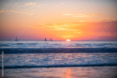 Sunset at the sea. Sunrise at beach. Colorful ocean beach sunrise. © Volodymyr