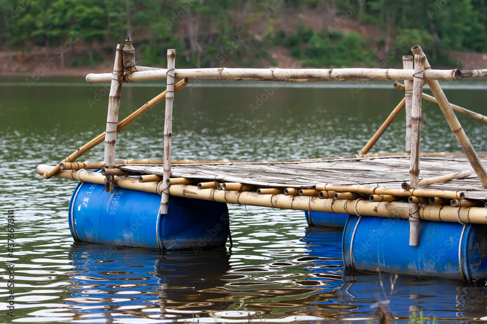 Raft made from bamboo and plastic bags use of natural materials combined with recycled materials to reduce waste and pollution of the world