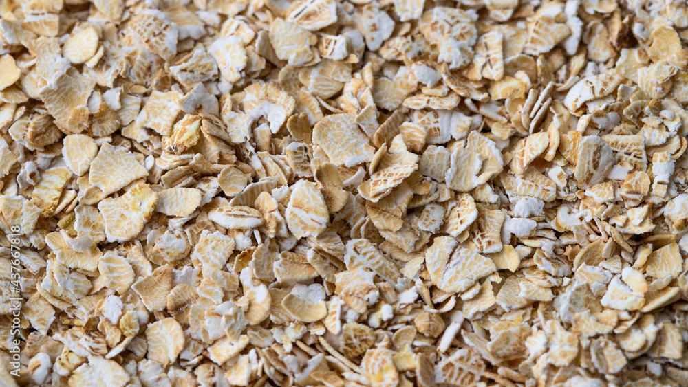 Oats flakes background. Oatmeal detail for packaging Oats flakes background. Oatmeal detail for packaging