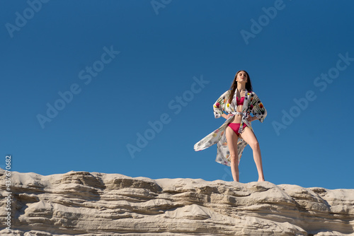 Attractive woman with sarong. Pareo and tunic