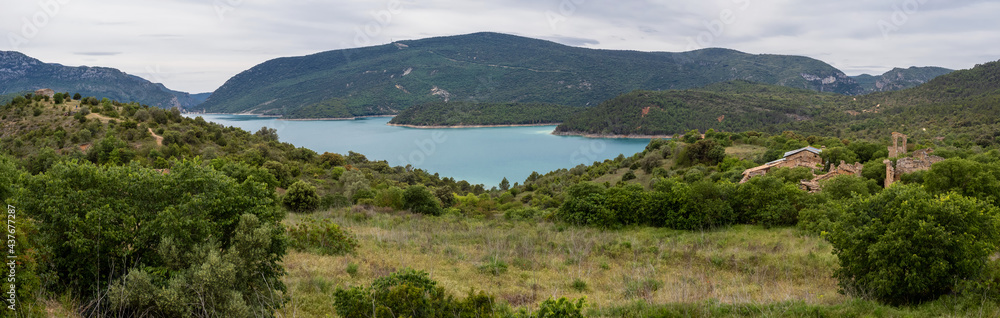 Panoramic view of Finestras uninhabited village at the edge of Canyelles reservoir, Spain