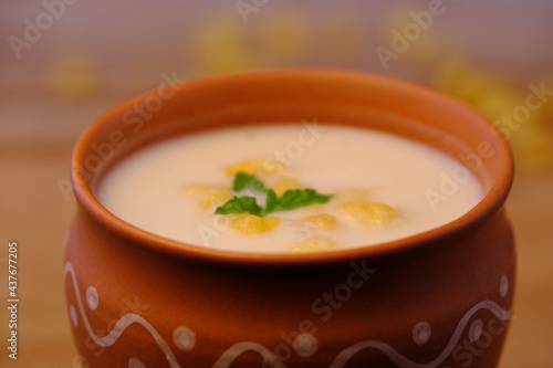 Indian style summer drink masala chach or raita made from buttermilk photo