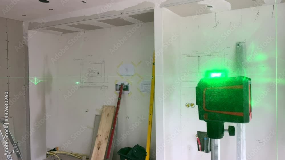 Modern construction laser level on construction site for precise