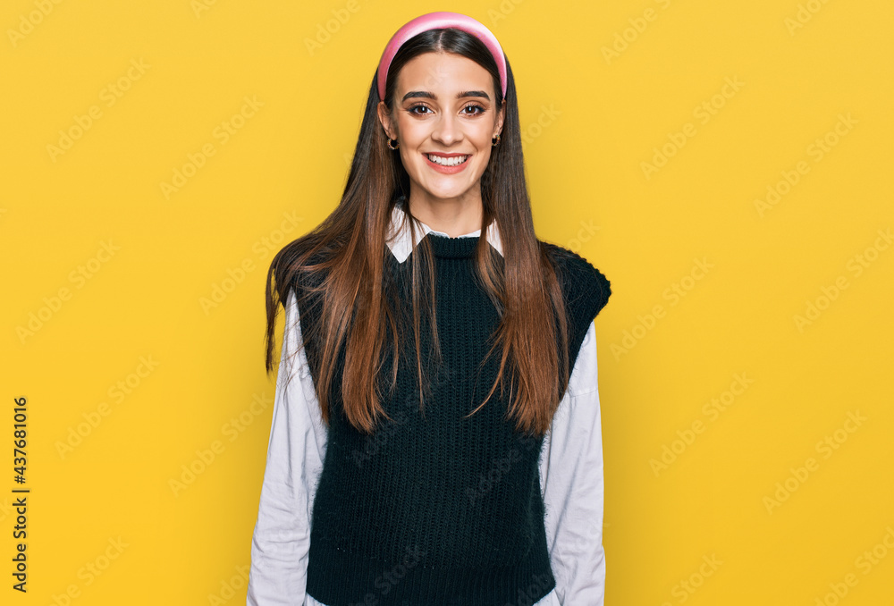 Fototapeta premium Young beautiful woman wearing casual white shirt with a happy and cool smile on face. lucky person.