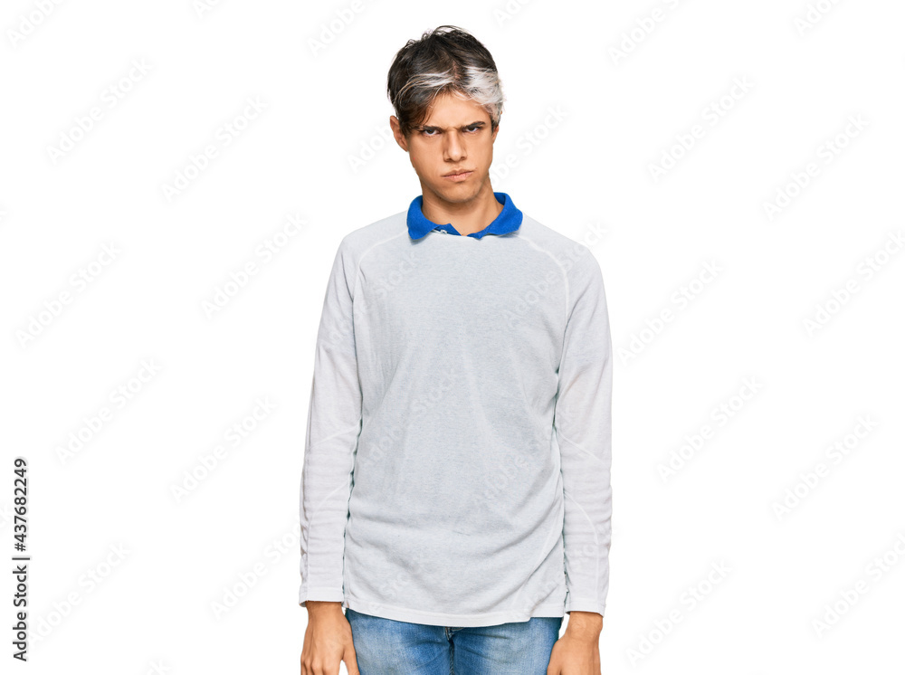 Young hispanic man wearing casual clothes skeptic and nervous, frowning upset because of problem. negative person. Young hispanic man wearing casual clothes skeptic and nervous, frowning upset because of problem. negative person.