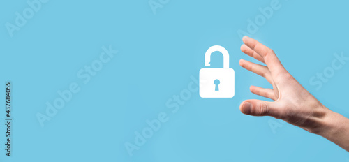 Male hand holding a lock padlock icon.Cyber security network. Internet technology networking.Protecting data personal information on tablet. Data protection privacy concept. GDPR. EU.Banner