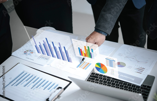 Quadro su tela Businesspeople meeting plan analysis graph company finance strategy statistics success concept and planning for future in office room