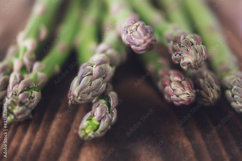Fresh green shoots of asparagus isolated on white background. Fresh green shoots of asparagus isolated on white background.