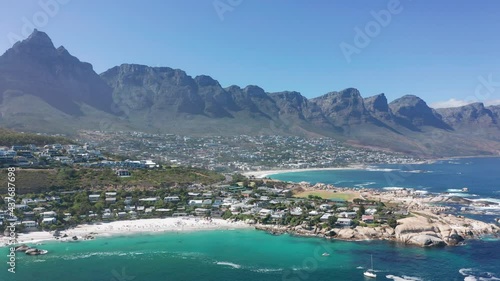 Aerial view. Shoreline of Camps Bay, Cape Town, South Africa, with Twelve Apostles mountains. CAPE TOWN, SOUTH AFRICA.