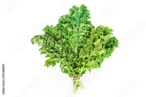 Kale leaves vegetable isolated on white background. Kale is considered a superfood because it s a great source of vitamins and minerals. Top view.