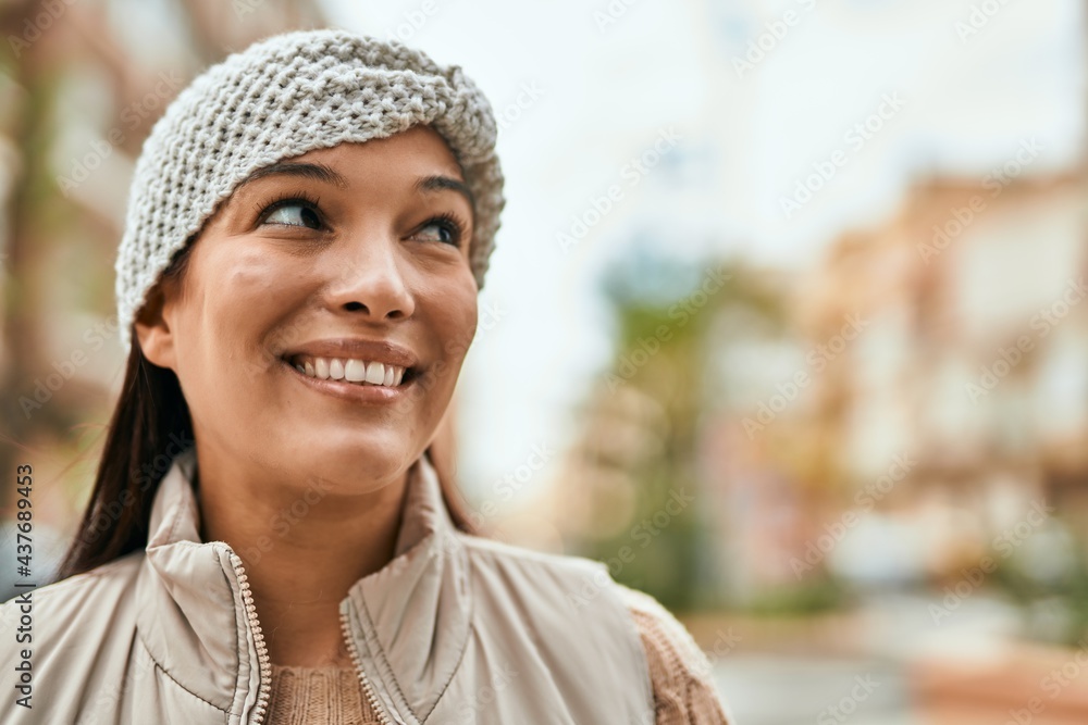 Young latin woman smiling happy standing at the city. Young latin woman smiling happy standing at the city.