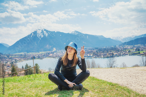 girl on a mountain in the alps. tegernsee lake.