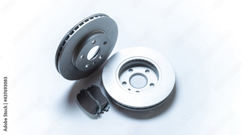 Car accessories. New metal car part. Auto motor mechanic spare or automotive piece isolated on white background. Technology of mechanical gear with space for text. Car accessories. New metal car part. Auto motor mechanic spare or automotive piece isolated on white background. Technology of mechanical gear with space for text.