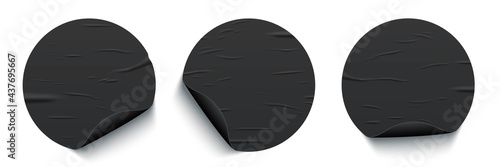 Glued round black stickers with curled edges set isolated on white background. Vector realistic crumpled posters bundle. Wet blank template texture. Empty advertising circles for creative design.