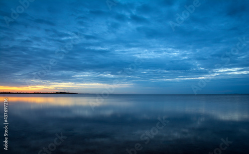 sunrise at coast of the sea bay