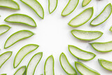 Natural green aloe vera stem cut into slices. Health and well being background