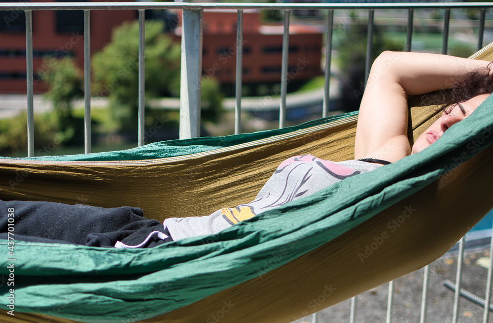 relaxed woman in a hammock