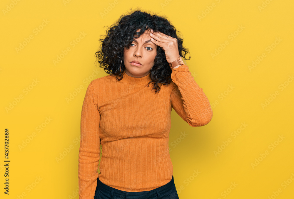 Young hispanic woman wearing casual clothes worried and stressed about a problem with hand on forehead, nervous and anxious for crisis Young hispanic woman wearing casual clothes worried and stressed about a problem with hand on forehead, nervous and anxious for crisis