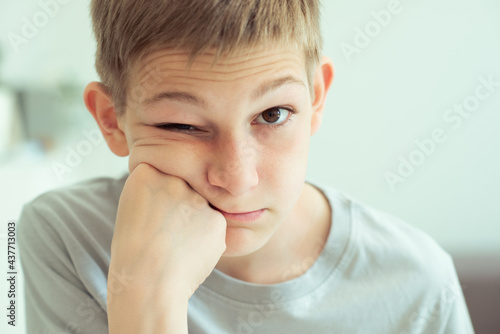 Closeup portrait of disappointed teen boy