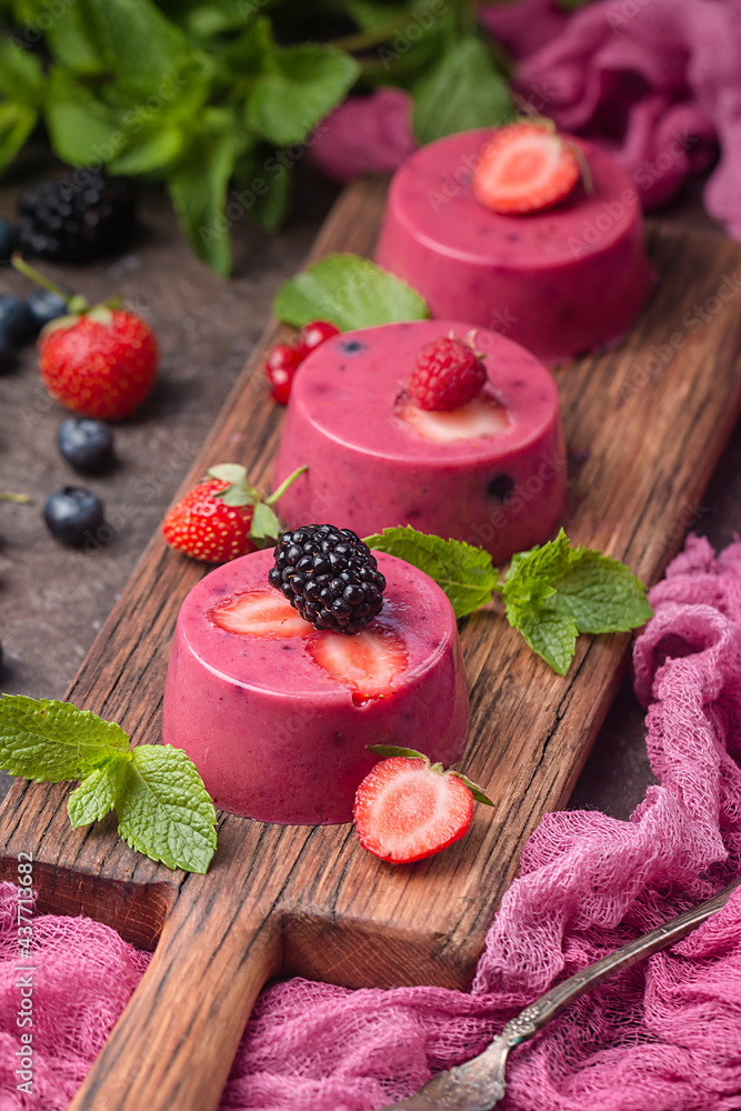 Summer dessert with berries and yogurt as a jelly pudding Summer dessert with berries and yogurt as a jelly pudding