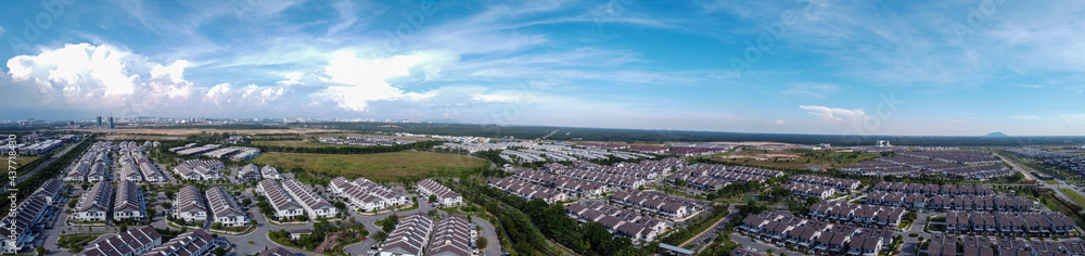 Aerial panorama view of the housing area with beautiful blue sky in background