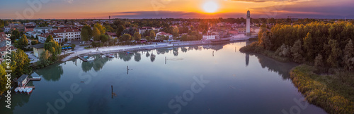 Aerial view shot by drone of the Casier harbour on the river Sile at sunset