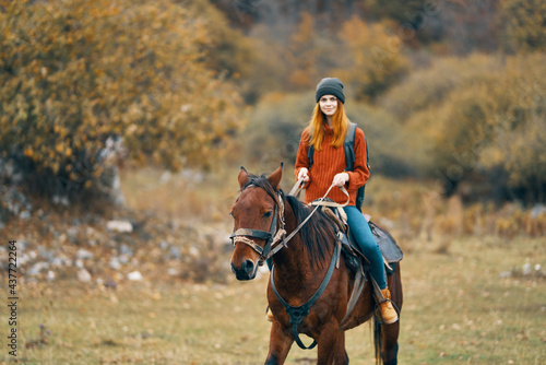 woman hiker riding horse travel mountain walk adventure