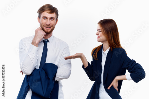 man and woman work colleagues communication finance work office 