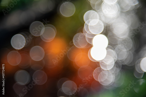 Red glitter vintage lights background. defocused.