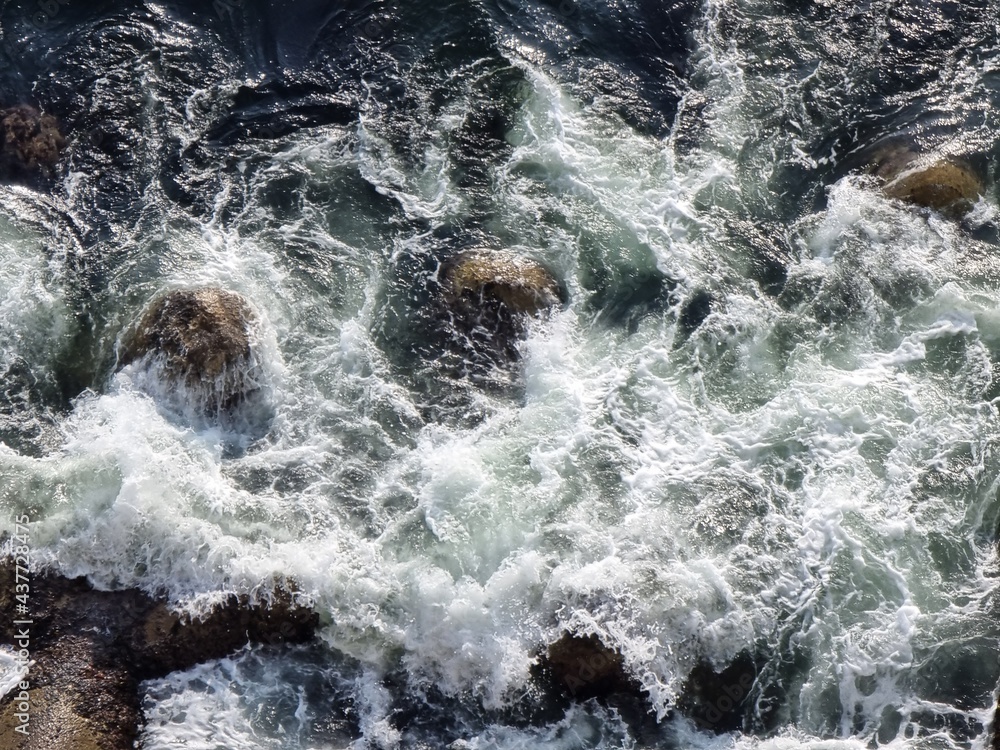 water flowing over rocks