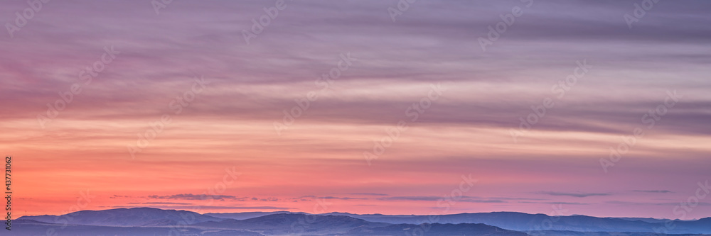panorama of colorful sky over Yampa River valley at dawn near Dinosaur National Monument in north western Colorado