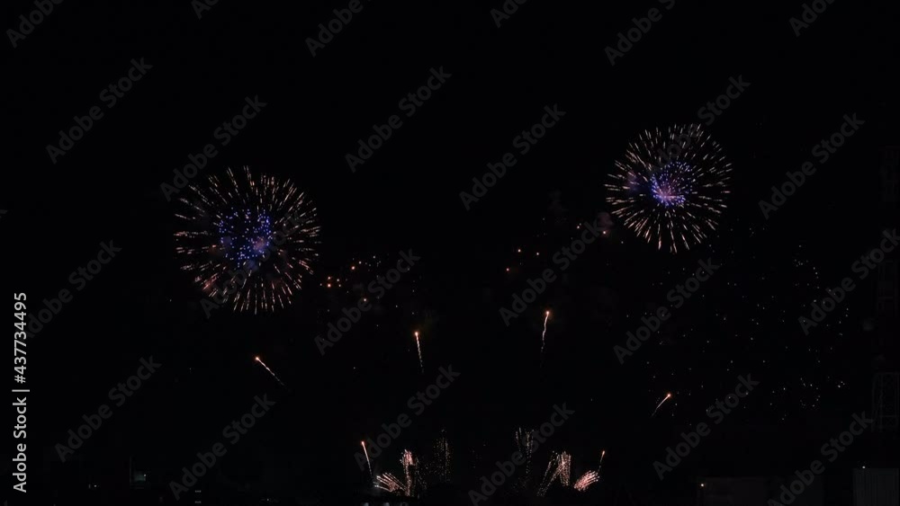 Display of real fireworks on dark background at night with multicolor and pattern during celebration or festival in city. Display of real fireworks on dark background at night with multicolor and pattern during celebration or festival in city.