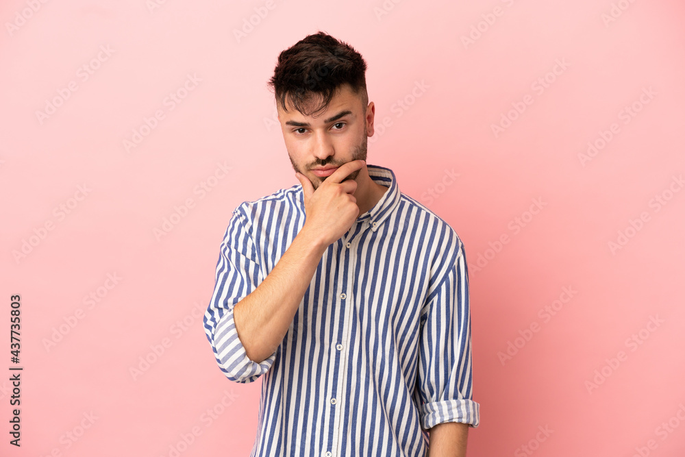 Young caucasian man isolated on pink background thinking Young caucasian man isolated on pink background thinking