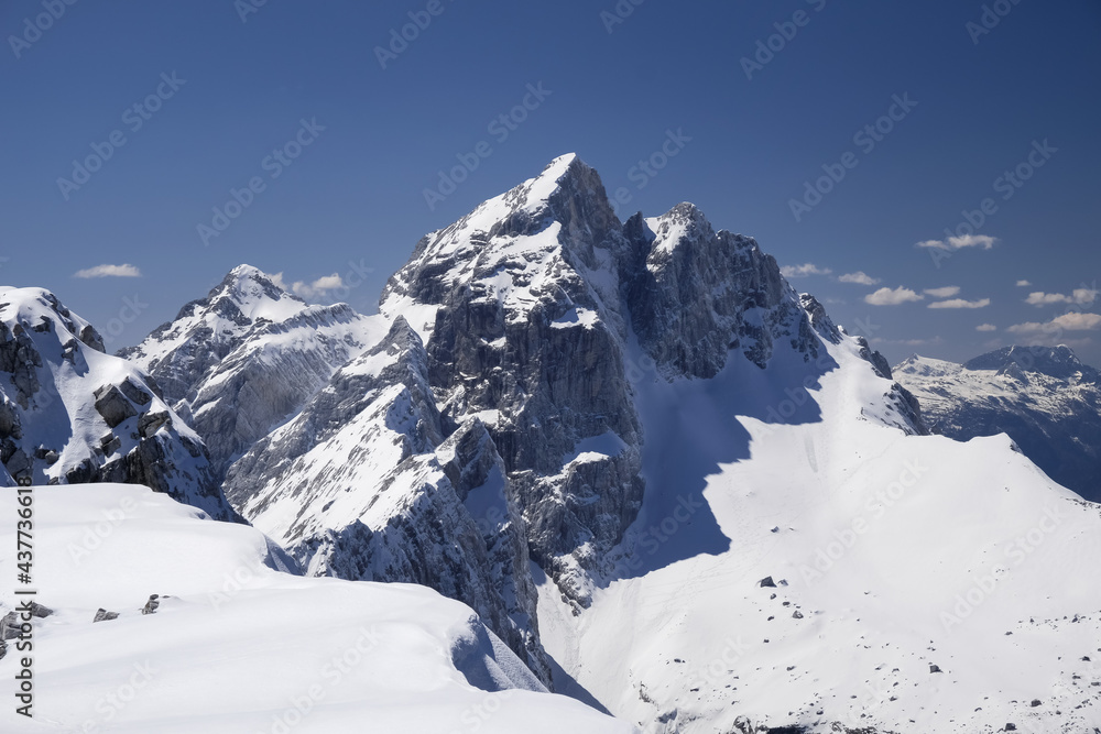severe view of spring still snowy slovenian alps Mala Mojstrovka