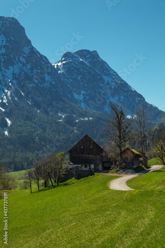 A wooden farmhouse in the Austrian Alps © hungry_herbivore