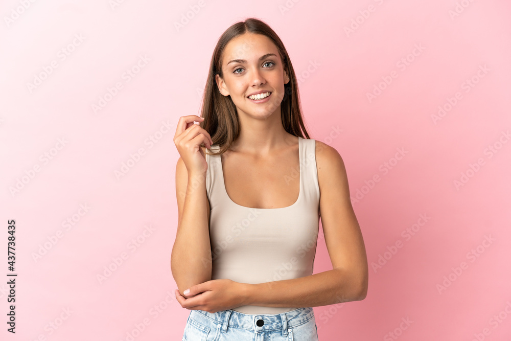 Young woman over isolated pink background laughing Young woman over isolated pink background laughing