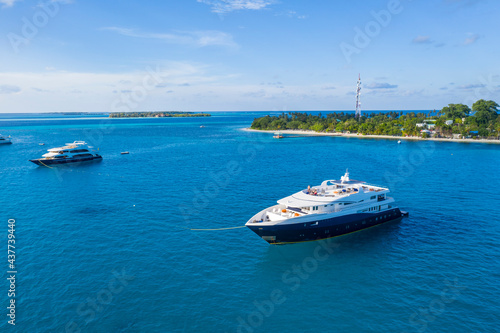 Aerial view of tourist ships near an island in the Indian Ocean