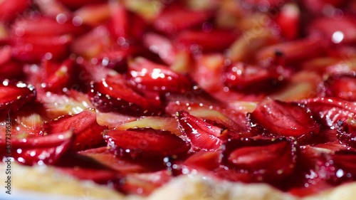 Homemade open pie gallet with strawberries and rhubarb. Shallow focus. photo