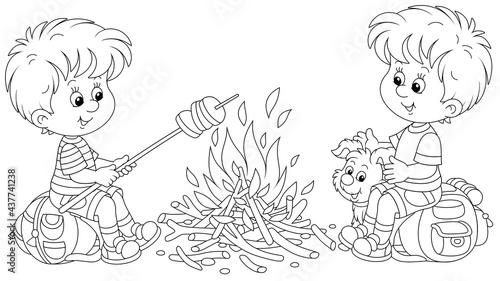 Little boy-scouts with a small pup in a forest camp, friendly smiling, talking and roasting bread on campfire, on summer vacation, black and white outline vector cartoon illustration