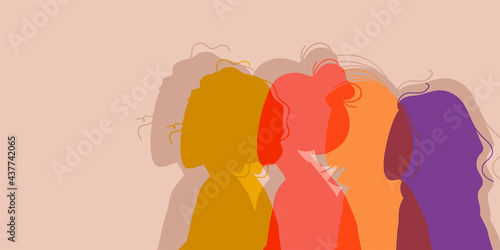 Women Silhouette of different cultures and nationalities standing together. The concept of the female empowerment movement and gender equality.