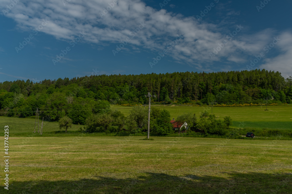 Meadows and fields between Vacov and Ckyne towns in Sumava mountains
