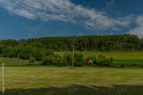 Meadows and fields between Vacov and Ckyne towns in Sumava mountains