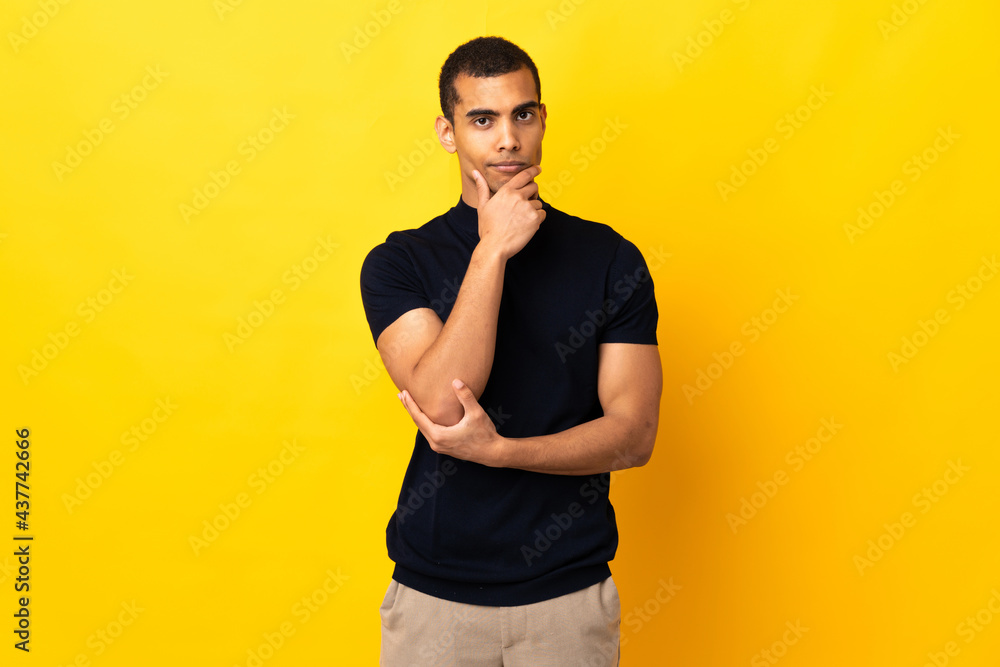 African American man over isolated background thinking African American man over isolated background thinking