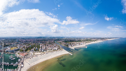 Italy, June 2021 - aerial view of the beach of the Romagna Riviera with Riccione, Rimini and Cattolica in the Emilia Romagna region © cristian