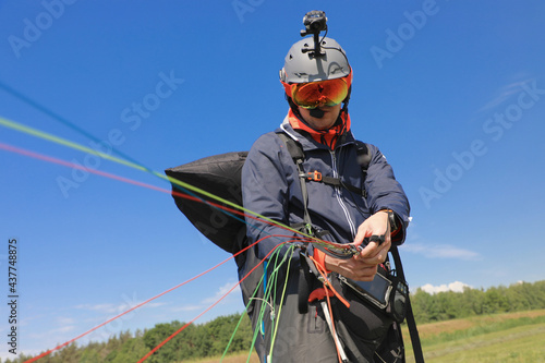 Parachutist landing with camera