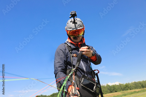 Parachutist equipment landing with camera