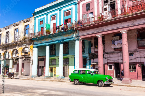 Old car and coloured houses in Old Havana © Michel