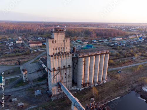 Golyshmanovo, Russia - May 6, 2021: Aerial view on grain elevator in the evening